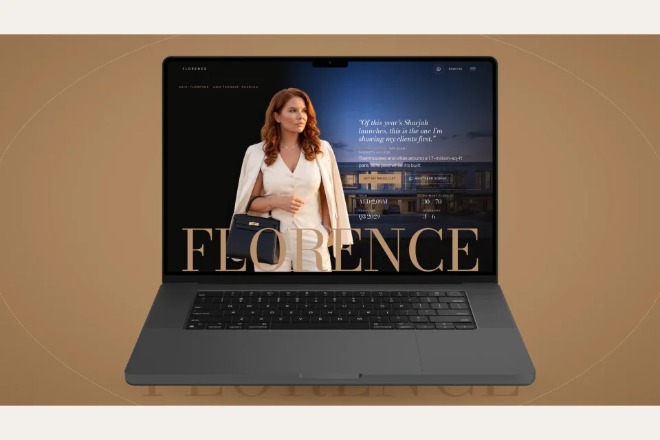 The Sophie Florence property website displayed on a laptop.