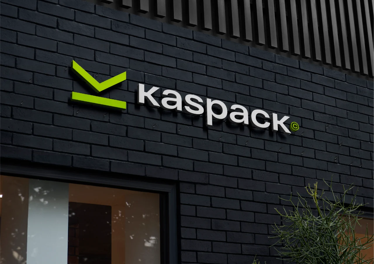 Kaspack: An open-box symbol and vivid lime colour connect the identity to packaging and logistics.