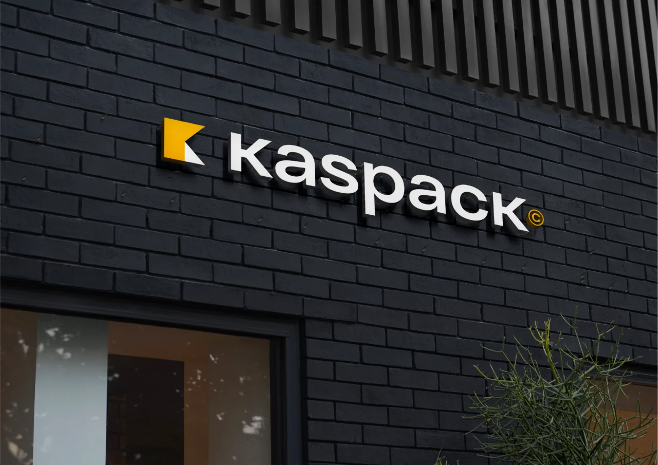 Kaspack: A folded yellow K becomes a bold graphic device across the packaging brand’s touchpoints.