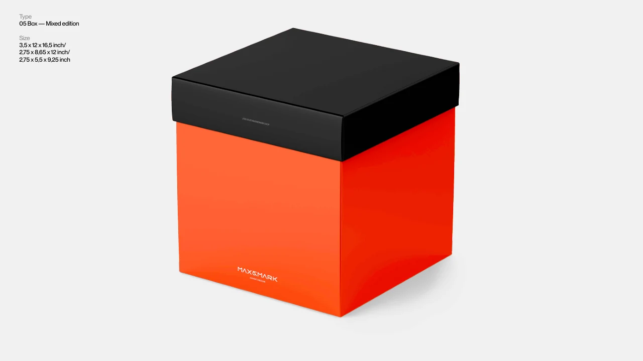 Max and Mark: A tall box in orange and black.