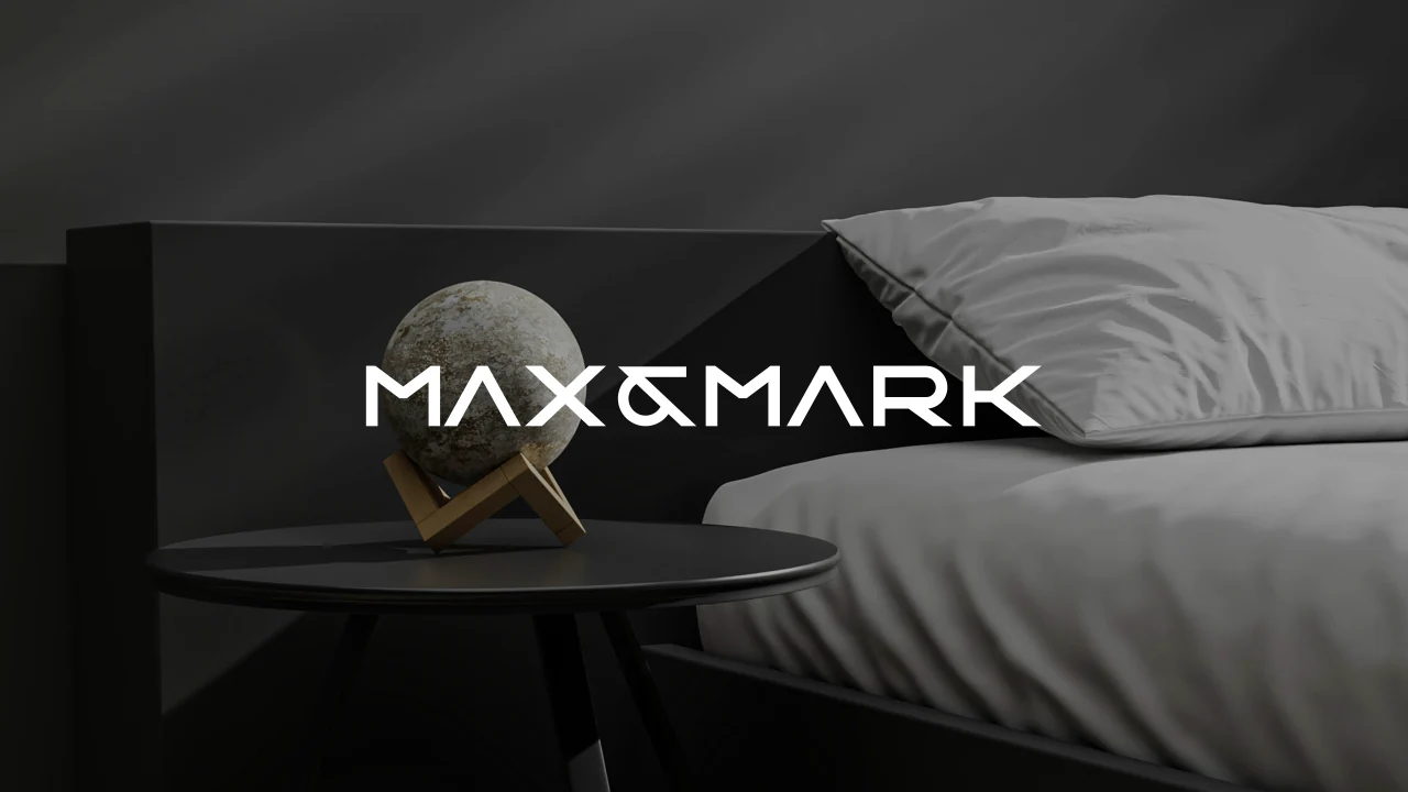 Max and Mark: A sharply drawn wordmark and a distinctive ampersand build a monochrome identity for Max and Mark.