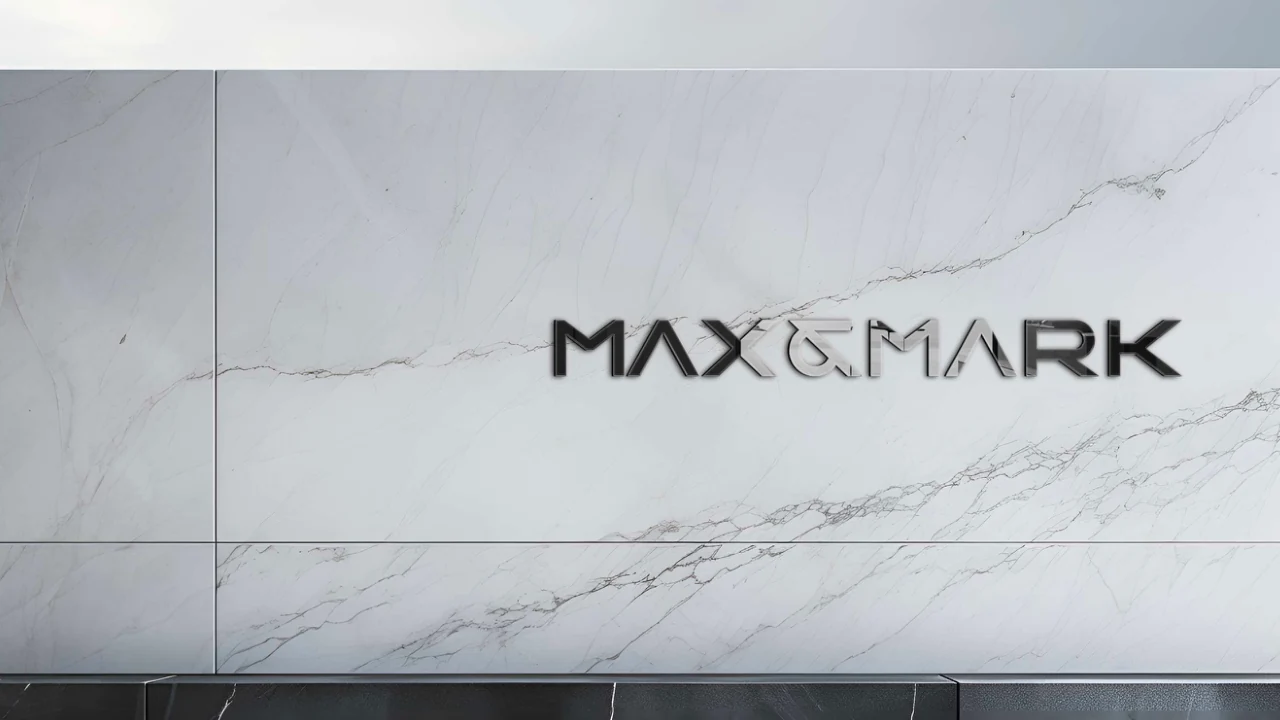 Max and Mark: The lettering applied to a stone surface.
